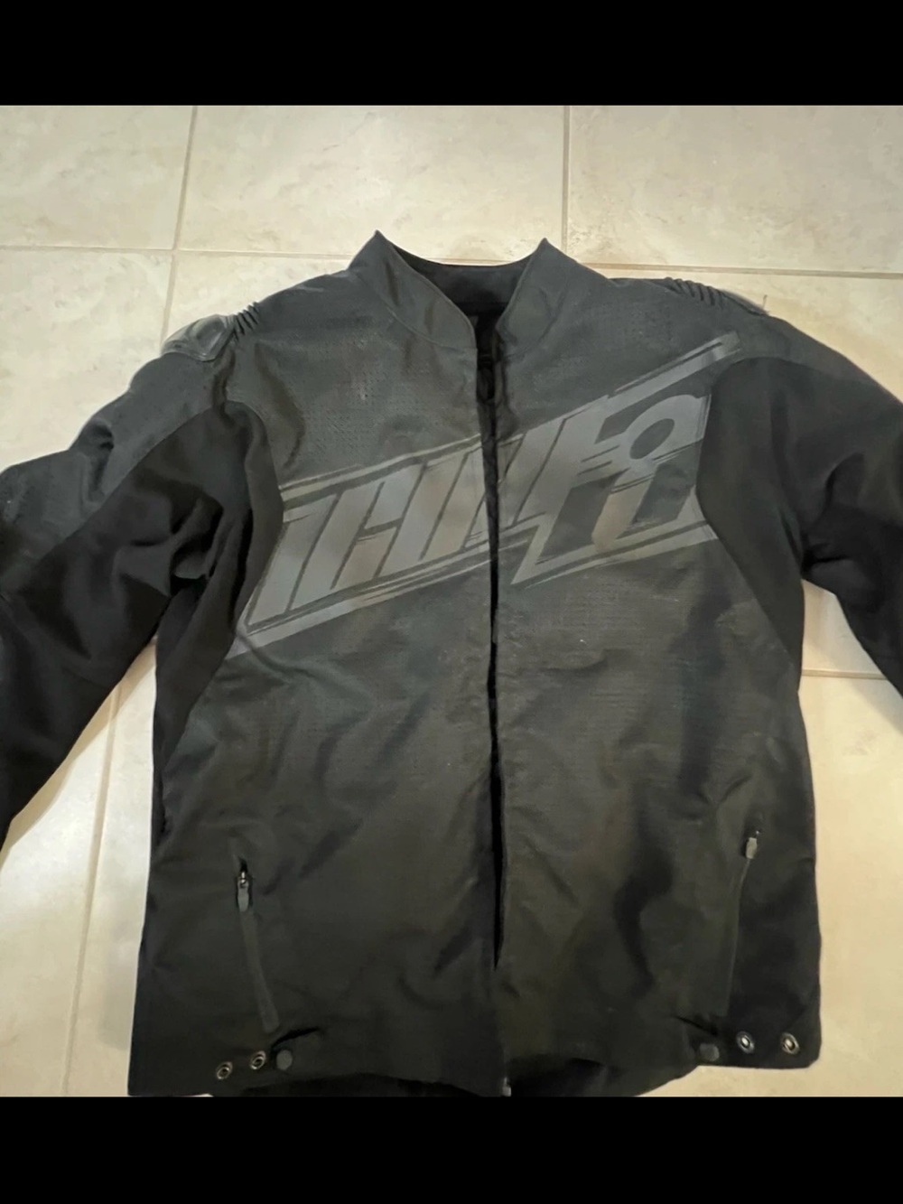 ICON Men's Black Performance Motorcycle Jacket with Tonal Logo